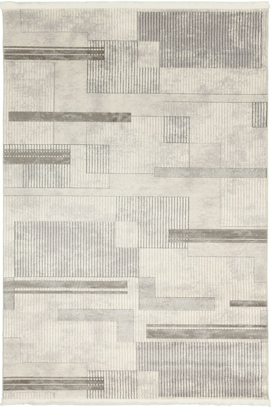 Premiere Atlas - Modern grafisk harmoni i lugna gråtoner – en matta som kombinerar struktur och stil.